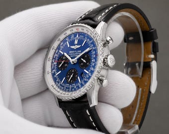 Reloj de hombre Breitling Navitimer Cronógrafo de 43 mm con esfera azul vintage, estilo piloto.