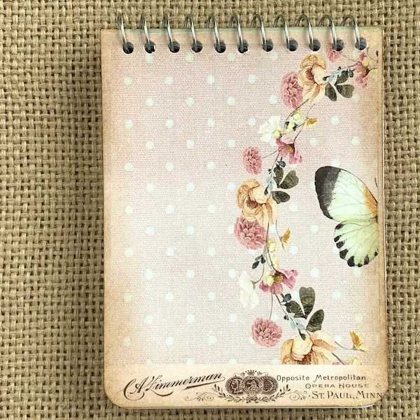 Mini spiral bound notebook with pink polka dots and butterfly