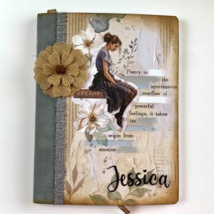 May include: A journal with a distressed, vintage aesthetic. The cover features a floral burlap accent, a watercolor illustration of a woman, and the text "Poetry is the spontaneous overflow of powerful feelings." The name "Jessica" is also displayed.