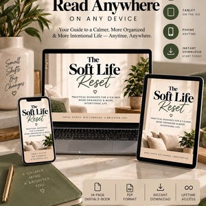 May include: A digital product mockup featuring The Soft Life Reset e-book displayed on a laptop, tablet, and smartphone. The screens show the title, subtitle, and a heart icon. A green notebook with the text A Calmer Mind A Brighter You is included.