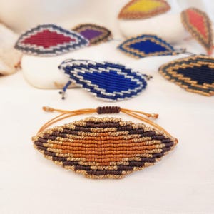 Pulsera de macramé de lujo con ojo malvado/Arte de macramé/Arte de fibra