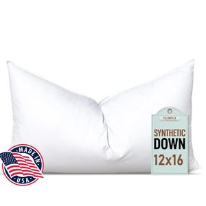 May include: A white 12x16 inch synthetic down pillow with a tag that reads "Synthetic Down 12x16" and a "Made in USA" label.