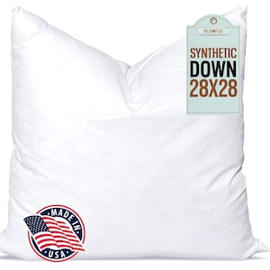 May include: A white pillow with a label that says "Synthetic Down 28x28" and a "Made in USA" label with an American flag.