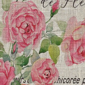 May include: A burlap fabric background with a floral design featuring pink roses and green leaves. The text "Le Fleurs" is written in black cursive script. The text "chicoree" and "au Lait un gout" is also visible.