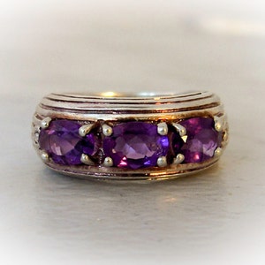 SALE.  Sterling Amethyst Ring      Designer Signed  Sadye L Vassil   SLV     Size 7   Retro Band  3 stone ring