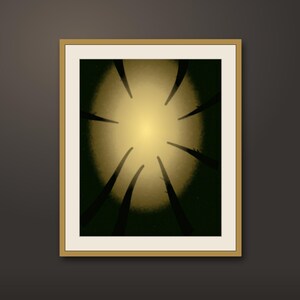 May include: A framed wall art print featuring a low-angle view of dark tree silhouettes reaching toward a bright, glowing circular light source in the center. The artwork is encased in a thin, light-colored wooden frame with a white mat border.