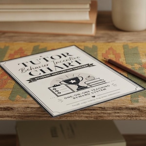 May include: A rectangular paper chart with black text and graphics on a cream background. The text reads: TUTOR Behavior Incentive CHART, STUDENT MOTIVATION TRACKER, ONE-ON-ONE TEACHING REWARD SYSTEM, and Small steps today, big wins tomorrow.