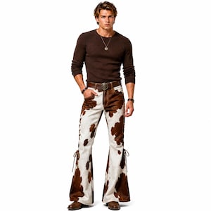 May include: A dark brown long-sleeved ribbed jumper paired with cow-print flared trousers featuring side lace-up details. The outfit includes a brown leather belt with a large metal buckle, a silver pendant necklace, and brown leather boots.