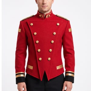 May include: A vibrant red military-style jacket featuring a high collar, double-breasted front with gold-toned buttons, gold shoulder epaulets, and black cuffs accented with horizontal gold bands. The jacket has a structured, tailored fit.