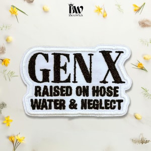 May include: A rectangular embroidered patch with a white background and a white border. The patch features black embroidered text that reads GEN X RAISED ON HOSE WATER & NEGLECT in a bold, sans-serif font, centered on the white fabric surface.