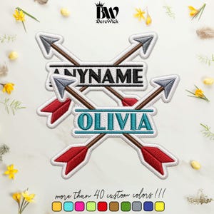 May include: An embroidered patch featuring two crossed arrows with grey tips and red fletching. The design includes two horizontal bars with the black text ANYNAME and the teal text OLIVIA. The BereWick logo is at the top with text below.