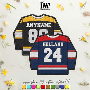 May include: Two embroidered hockey jersey patches. The top patch is black and yellow with the text ANYNAME and the number 88. The bottom patch is blue and red with the text HOLLAND and the number 24. Both feature white stripes and black borders.