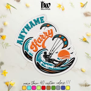 May include: A circular embroidered patch featuring a kitesurfer riding a wave with an orange sun in the background. The text ANYNAME is arched in teal, and the name Harry is embroidered in orange script. The design includes teal and black details.