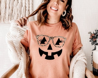 Halloween Womens Shirt with a Girl Jack O Lantern Printed on an Oversized Soft Cotton Tshirt, Fall Pumpkin Face with Eyelashes Leopard Print