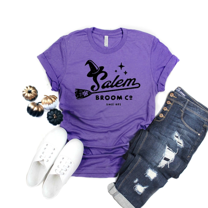 Women Halloween Shirt with Saying Salem Broom Co Printed in Black on a Heather Purple Fall T-shirt, Witch Halloween Plus Size Clothing 