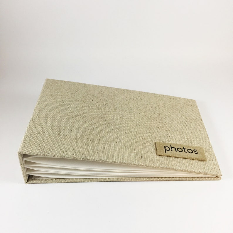 Linen Instax Mini Al With White Leather Label Erscotch Thread And Holds 48 Photos In Hand Placed Black Photo Corners