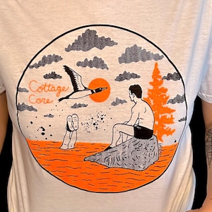 May include: A set of three ceramic mugs with a speckled, matte finish. The mugs are in shades of cream, light gray, and dark gray. Each mug has a simple, minimalist design, perfect for coffee or tea.