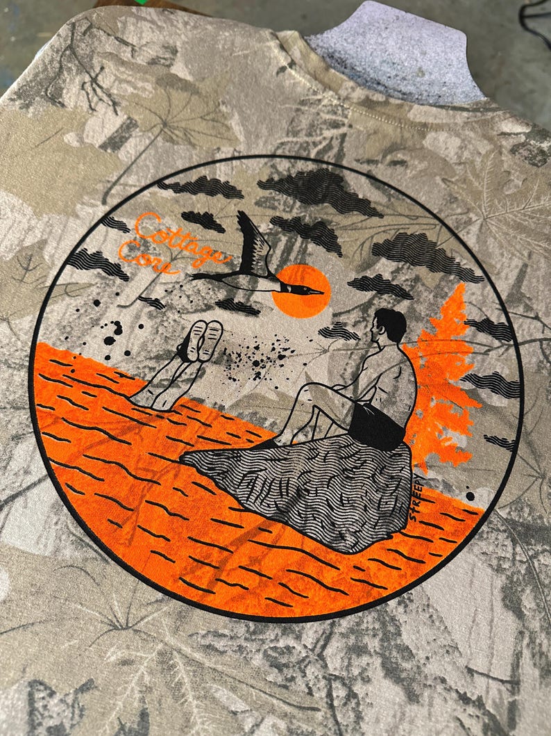 May include: A set of three ceramic mugs with a speckled, matte finish. Each mug features a different color: light blue, cream, and gray. The mugs have a simple, modern design with a rounded shape and a comfortable handle.