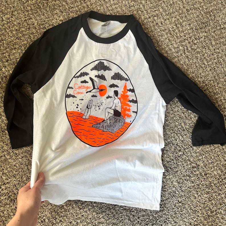 May include: A set of three ceramic mugs with a speckled, matte finish. The mugs are in shades of cream, light gray, and dark gray. Each mug has a simple, minimalist design, perfect for coffee or tea.