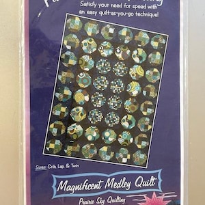 May include: Quilting pattern for a "Magnificent Medley Quilt" with a colourful geometric design. The pattern is for crib, lap, and twin sizes. The pattern is from Prairie Sky Quilting.