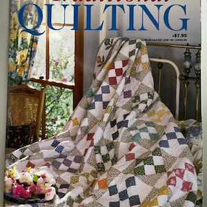 May include: A magazine cover for Traditional Quilting with a colorful quilt on a bed. The cover features the text "Traditional Quilting" and "10 Quilt projects to make".