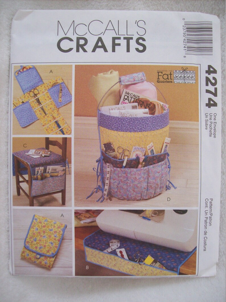 May include: Sewing pattern for a fabric envelope, chair cushion, and sewing machine accessory. The pattern is designed for use with Fat Quarters fabric. The pattern is called "One Envelope" and is McCall's Crafts pattern number 4274.