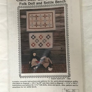 May include: A pattern booklet for quick-pieced miniatures, including a charn dash quilt, nine-patch quilt, folk doll, and settle bench. The booklet includes instructions and patterns for each project. The cover features a photo of the finished projects.