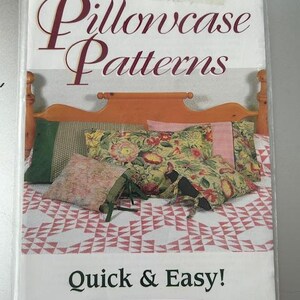 May include: A package for pillowcase patterns. The cover features a bed with patterned pillows and a quilt. The text reads "Pillowcase Patterns" and "Quick & Easy!" with the brand name "Patches Pallette" at the bottom.