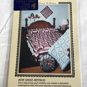 May include: A vintage "Heritage Quilts" pattern book. The cover shows a bedroom scene with a quilt. The text on the cover includes "Caryn's Country Closet" and "New Speed Method". The quilt on the bed has a red and white geometric pattern.