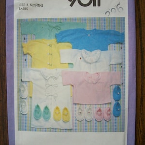 May include: Simplicity sewing pattern number 9011 for babies, featuring six different styles of baby clothes, including a white onesie with a lace collar, a pink onesie, a yellow onesie, a blue onesie, a green onesie, and a white onesie with a bow tie. The pattern also includes instructions for making matching baby shoes.