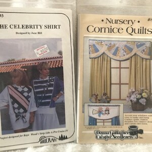 May include: Two sewing patterns, one for a shirt and one for cornice quilts. The shirt pattern features a woman wearing a striped shirt. The cornice quilt pattern shows a window with a cornice quilt and curtains. The text on the patterns reads "The Celebrity Shirt" and "Nursery Cornice Quilts".