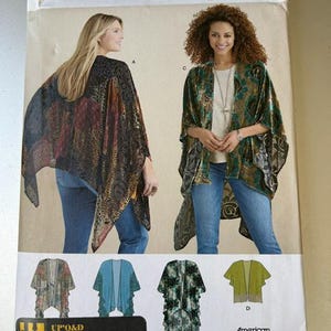 May include: A Simplicity 8419 sewing pattern envelope for a loose-fitting kimono-style wrap with an asymmetrical hem. The cover features two views of the garment in patterned fabric, along with four smaller illustrations showing variations A, B, C, and D.