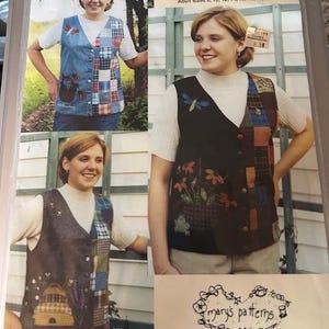May include: A sewing pattern for Mary's Garden Vest, adult sizes 8-22. The vest has a patchwork design with floral and insect motifs. The image shows the vest in different colours and styles, with the text "Mary's Garden Vest" and "mary's patterns".