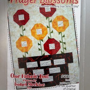 May include: A quilting pattern for a wall hanging called "Prayer Blossoms" by Isobel Meckins for Block Party Studios, Inc. The pattern includes one fat quarter of original hand-printed fabric. The finished wall hanging measures 36 1/2 inches by 51 1/2 inches.