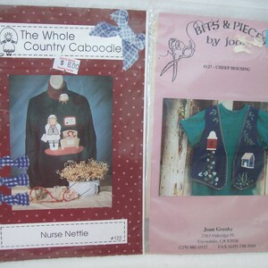 May include: Two craft patterns for sewing projects. The first pattern is for a sweatshirt with a nurse applique. The second pattern is for a vest with a birdhouse and a small house applique. Both patterns are on pink and white backgrounds with a red and white gingham bow.