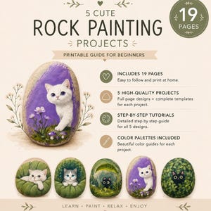 May include: A printable guide titled 5 Cute Rock Painting Projects featuring 19 pages of step-by-step tutorials for beginners. The document includes five high-quality designs, colour palettes, and templates, illustrated with painted rocks showing cats.