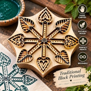 May include: A light-coloured wooden block printing stamp featuring a symmetrical star-shaped design with heart and leaf motifs. The stamp has raised edges for ink application and includes text labels: Hand Carved, Natural Wood, Perfect Prints, Reusable, and Traditional Block Printing.