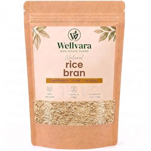 May include: A light brown stand-up pouch containing rice bran. The label features the text Wellvara, Natural rice bran, HANDMADE | PURE | NATURAL, 100% ORGANIC, CHEMICAL FREE, and HANDMADE WITH CARE, along with leaf illustrations and icons.
