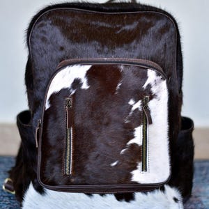 Cowhide Leather Backpack – Brown & White Cow Print Backpack with Front Zipper Pockets