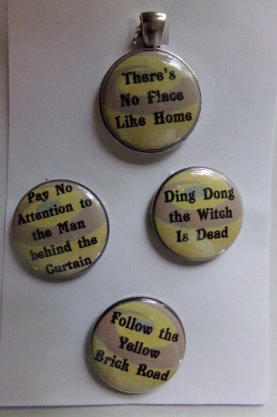 Favorite phrases from the Wizard of Oz in this magnetic pendant set Silver tone 1 base; 24 ball chain; organza bag included.