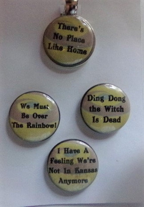 Favorite phrases from the Wizard of Oz in this magnetic pendant set Silver tone 1 base; 24 ball chain; organza bag included.