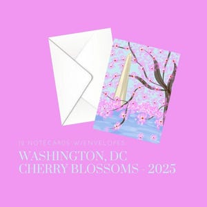 May include: A set of 12 notecards with envelopes featuring a watercolour illustration of the Washington Monument with cherry blossoms in bloom. The text "WASHINGTON, DC CHERRY BLOSSOMS - 2025" is printed below the image.