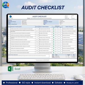 May include: A computer monitor displaying an Audit Checklist document with a table of requirements, evidence, and observations. The screen shows text including Audit Type, Department, Auditor, and Date. Below the monitor is a white keyboard and mouse.