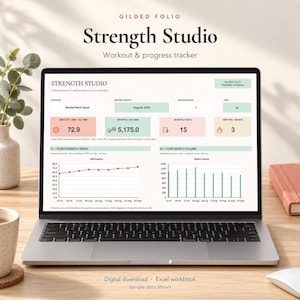 May include: A laptop screen displaying the Gilded Folio Strength Studio workout and progress tracker, an Excel workbook with data fields for exercise, report month, monthly volume, sets, and new PRs, alongside line and bar charts visualizing strength trends.