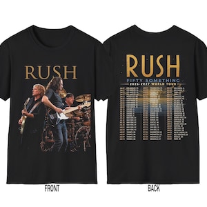 May include: A black short-sleeve t-shirt featuring a front graphic of the band Rush performing on stage with the text RUSH. The back displays the text RUSH FIFTY SOMETHING 2026-2027 WORLD TOUR above a list of tour dates and locations in white text.