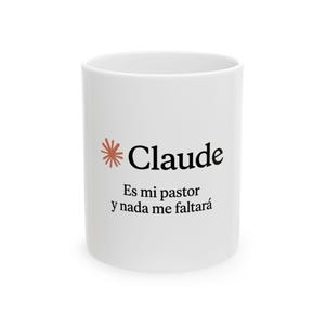 May include: A white ceramic mug featuring a rust-colored starburst icon next to the black text "Claude" and the phrase "Es mi pastor y nada me faltará" printed in black serif font on the front surface of the cylindrical drinking vessel.