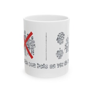 May include: A white ceramic mug featuring a black graphic of a group of people crossed out with a red X, next to a vertical line and a collection of black robot and gear-filled head icons, with text printed along the bottom in a distressed font.