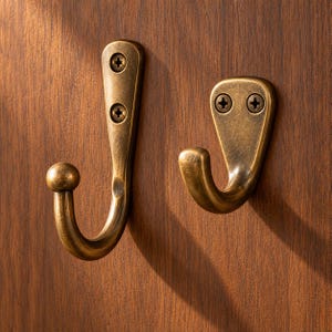 Wall Hooks in Classic Rounded and Ball Tip Styles, Gold Tone, Bronze Tone and Black Finishes