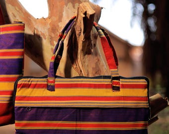 Hand made padded laptop bag made of Ugandan kikoyi material