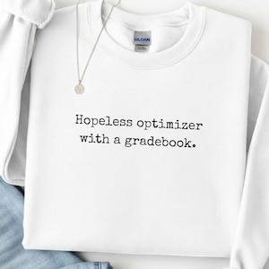 Hopeless optimizer with a gradebook crewneck sweatshirt | teacher humor